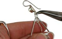 Pliers attaching ear wire